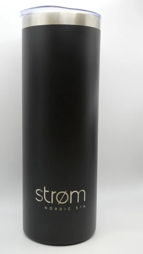 Fiber laser engraved black stainless steel tumbler with Strom Nordic Spa logo branding.