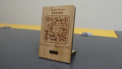 Laser cut plywood Google Review counter display stand with custom name engraving.